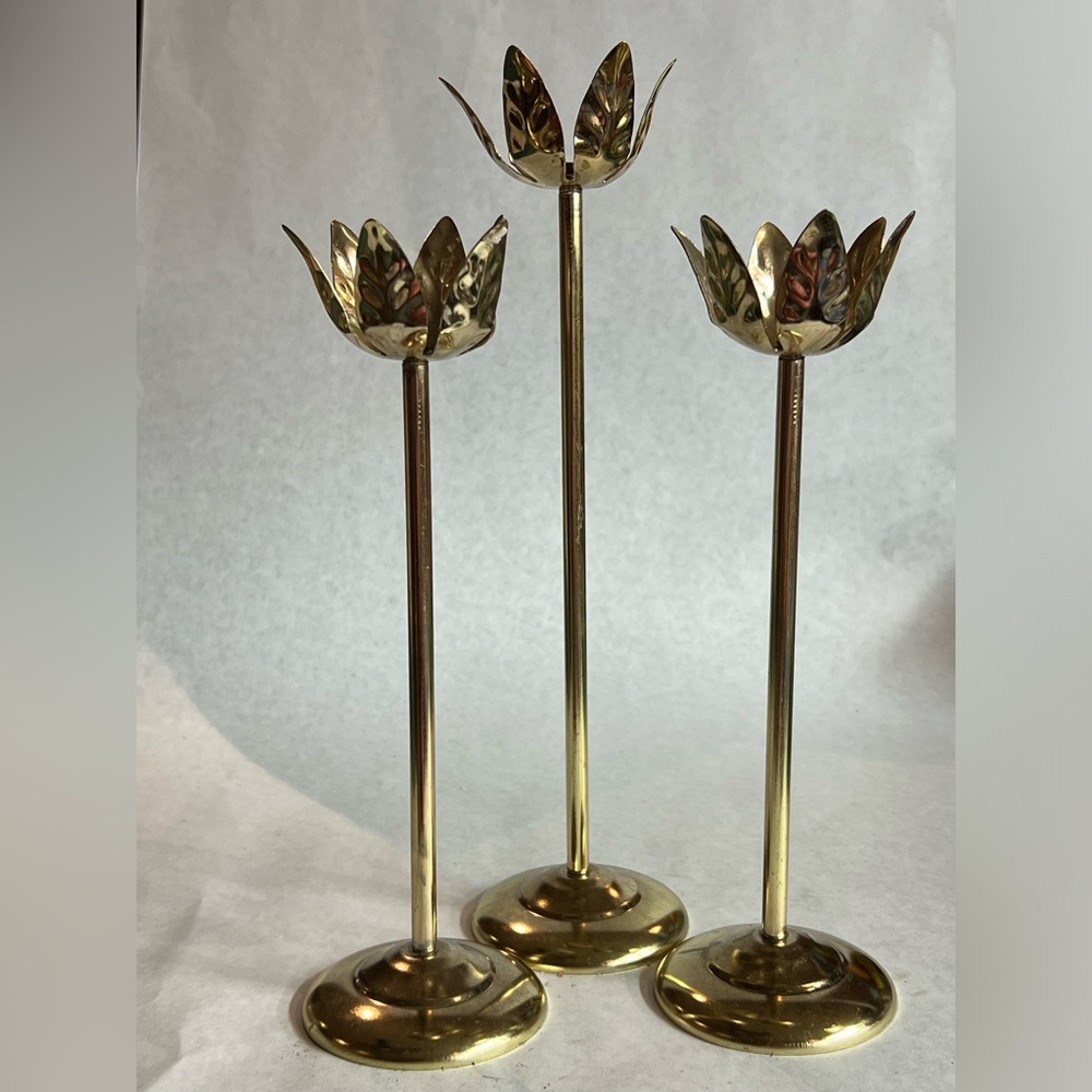 Vintage set of three brass lotus candle holders